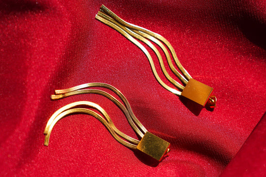 Golden Flow Statement Earrings